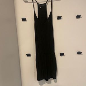 Super comfy black romper with pockets from Brandy Melville.